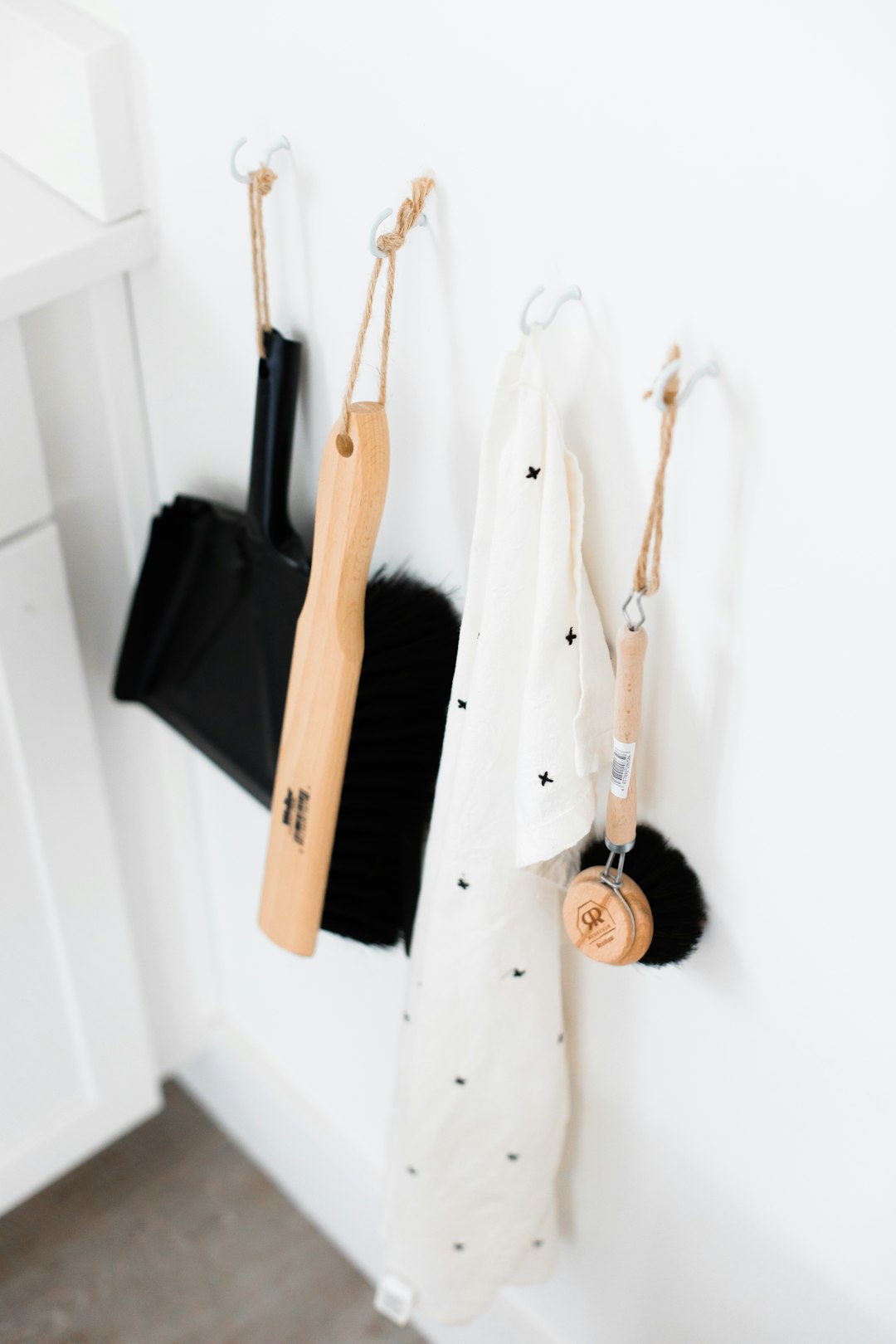 three-black-and-brown-bathroom-cleaning-tools-rhh4ytfvsw4
